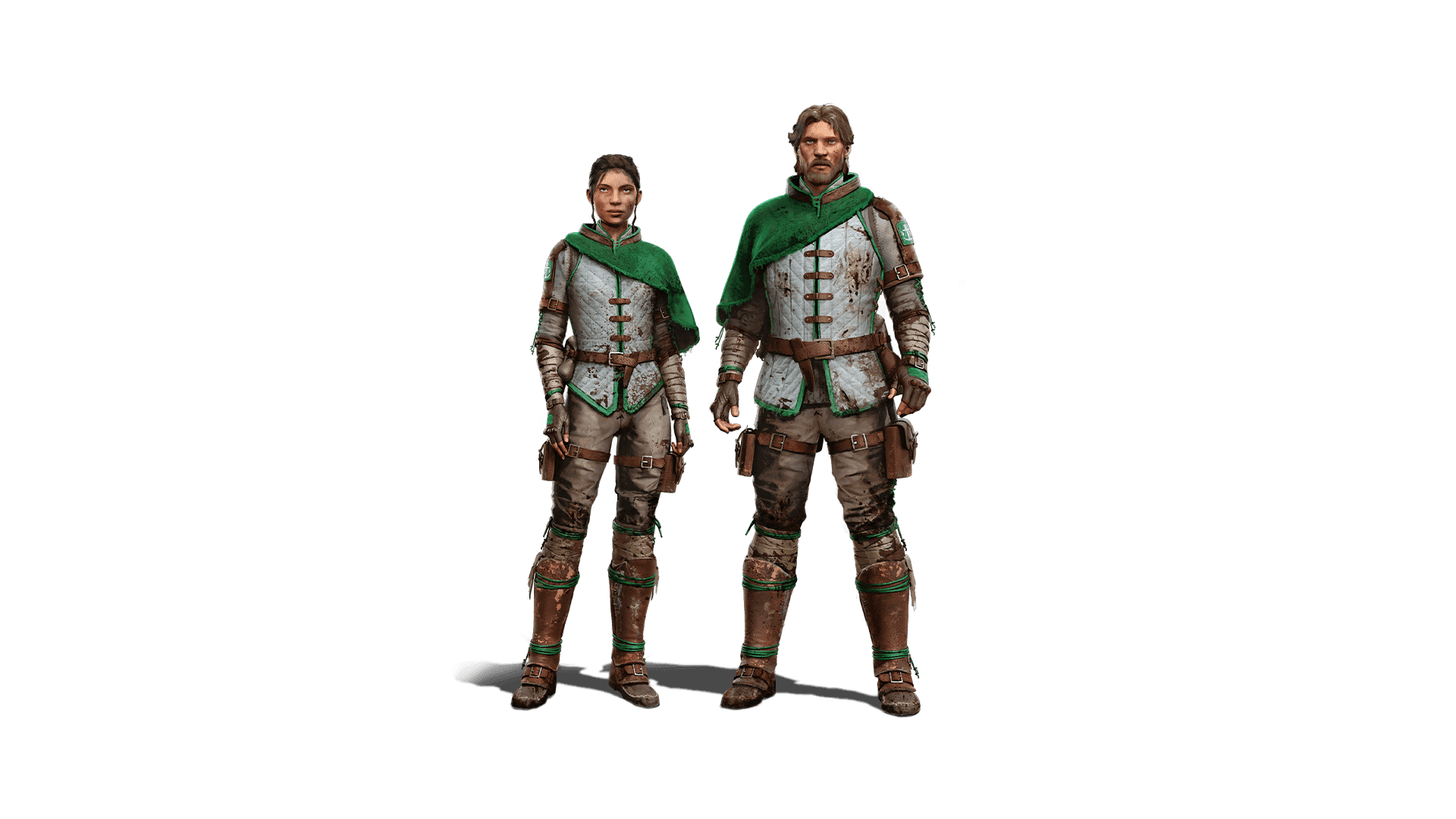 A male and female stand side by side adorned in green cloth, white shirts and leather riding pants. Speckled with mud an a cloak over one shoulder